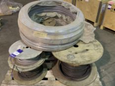 Pallet of 6x reels of cabling and 2x reels of plastic pipe