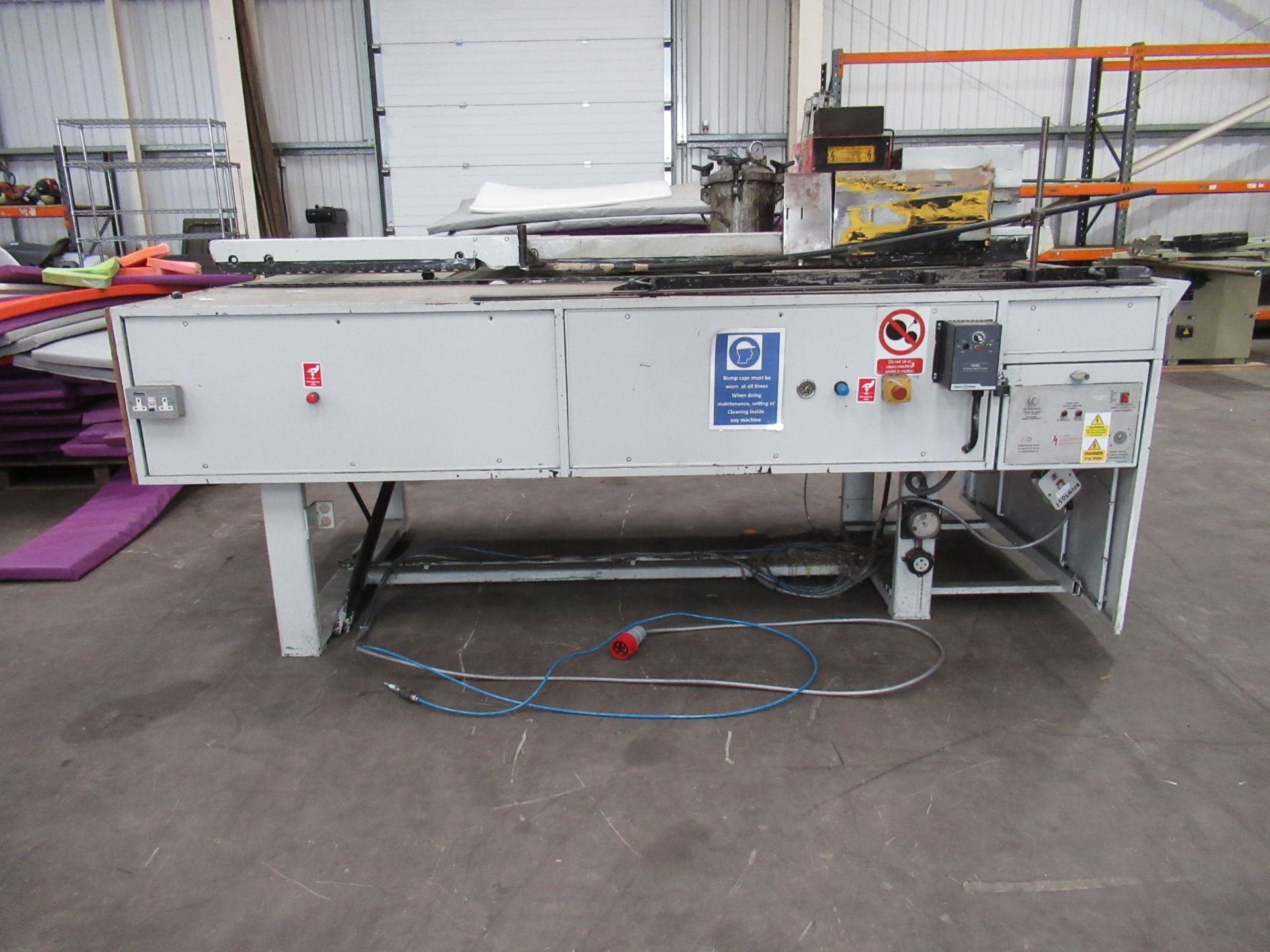 A Commercial Hot Melt/PVA Box Gluing Machine.