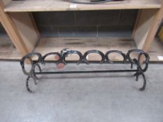 A Fabricated Wellington Boot Stand (made out of horse shoes)