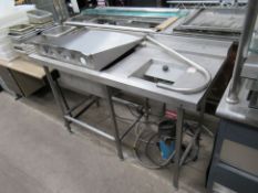 A stainless steel deep bowl sink unit and masserator.