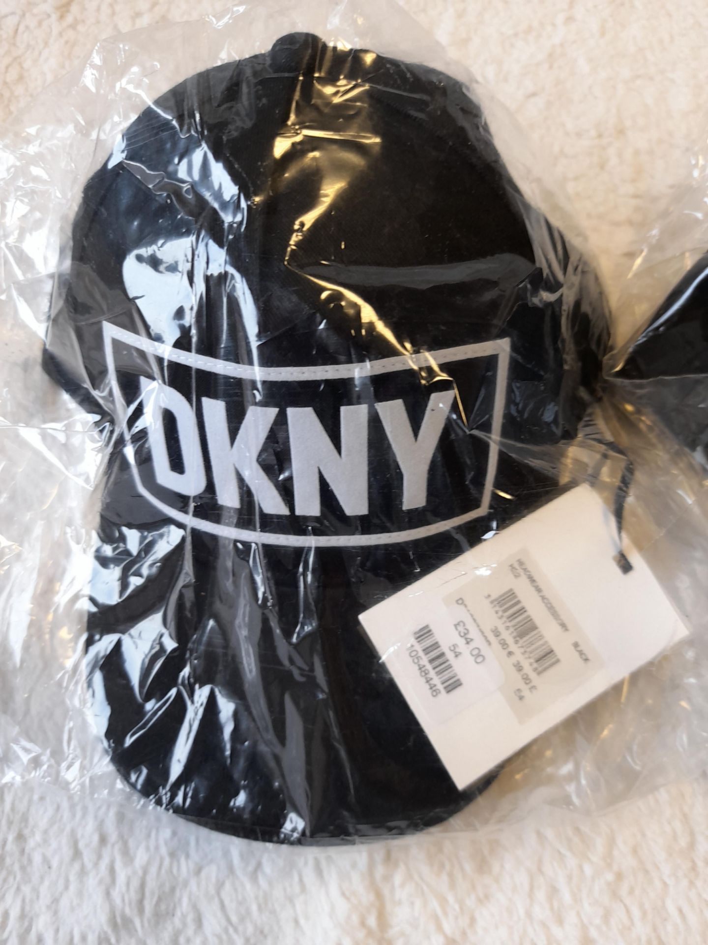 2 x DKNY black caps, RRP £34.00 each (total £68.00 - Image 2 of 5