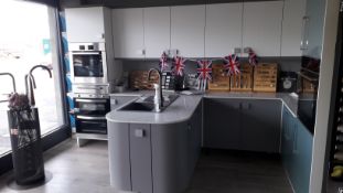Dove Grey and White Display kitchen with 10 x ECF Dove Grey Gloss units under, including a soft
