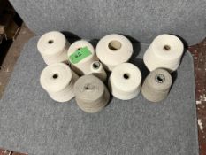 Mixed sizes cream/neutral/beige yarn cones
