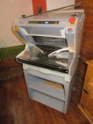 2011 JAC MRK 450/14 Pico 230 Volt Bread Slicing Machien on Mobile Stand and a Bag Tapers and a qty o
