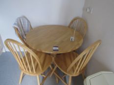 Pine effect circular dining room table 3’ diameter with 4 spindle backer chairs