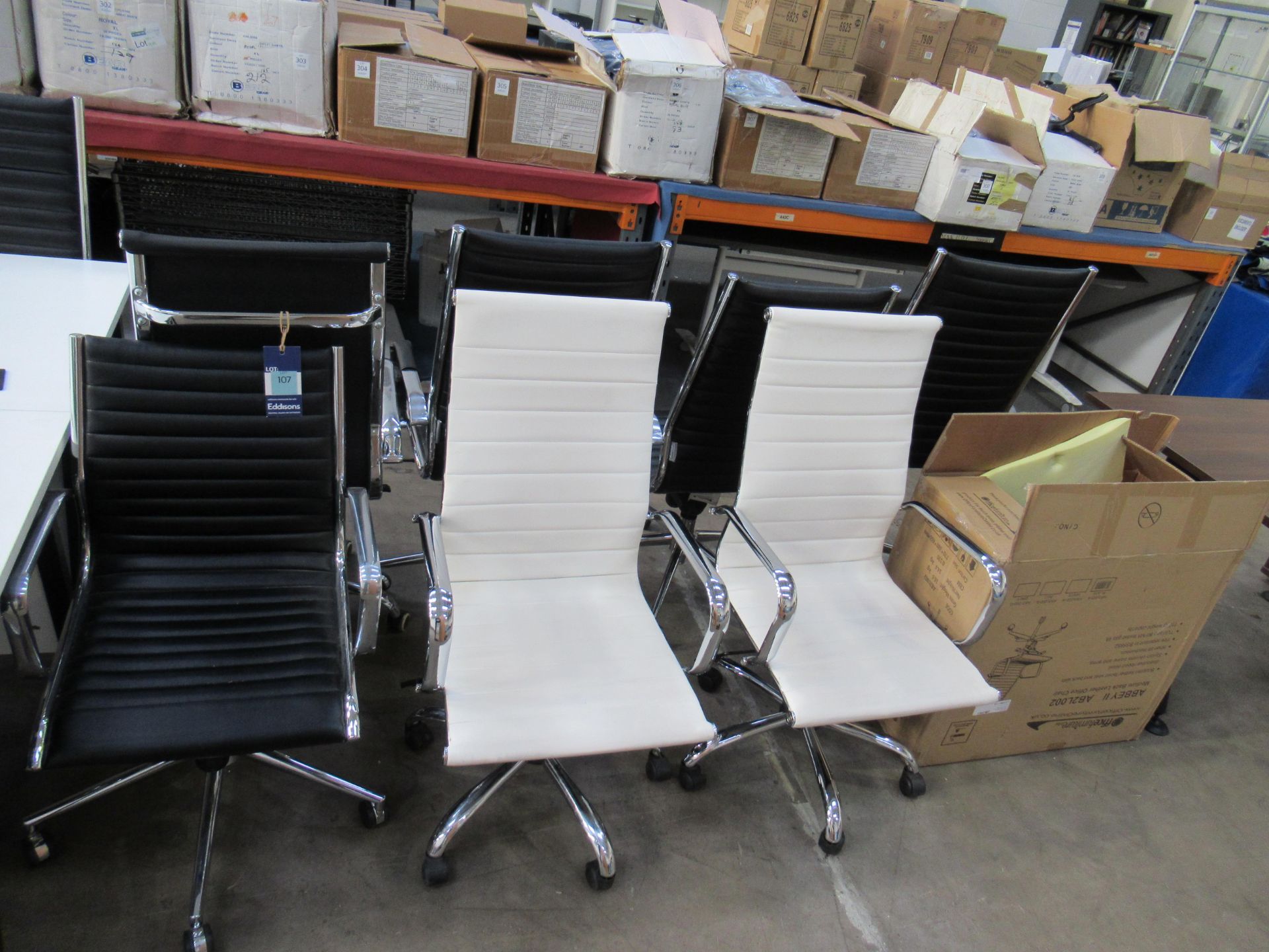 8 x Ribbed Leather and Chrome Operators Chairs (6 x Black, 2 x White) including one boxed and unused