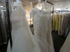 4 various bridal gowns to rail