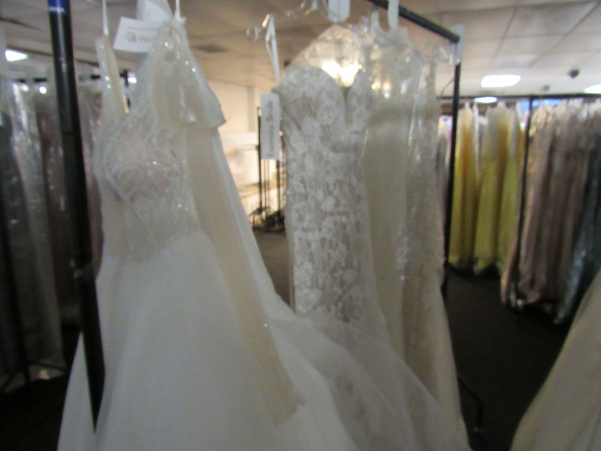 4 various bridal gowns to rail