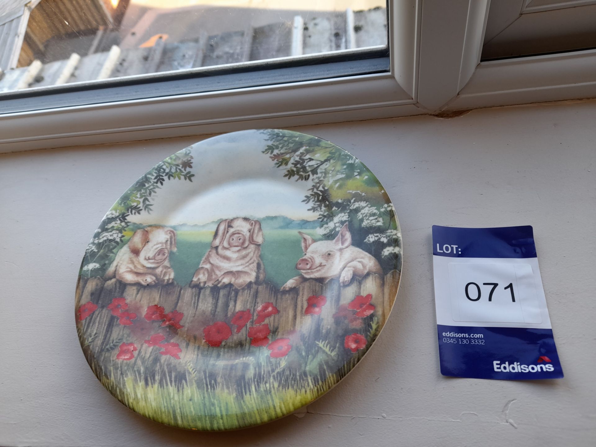 Bone China plate depicting 3 pigs by Ann Blockley