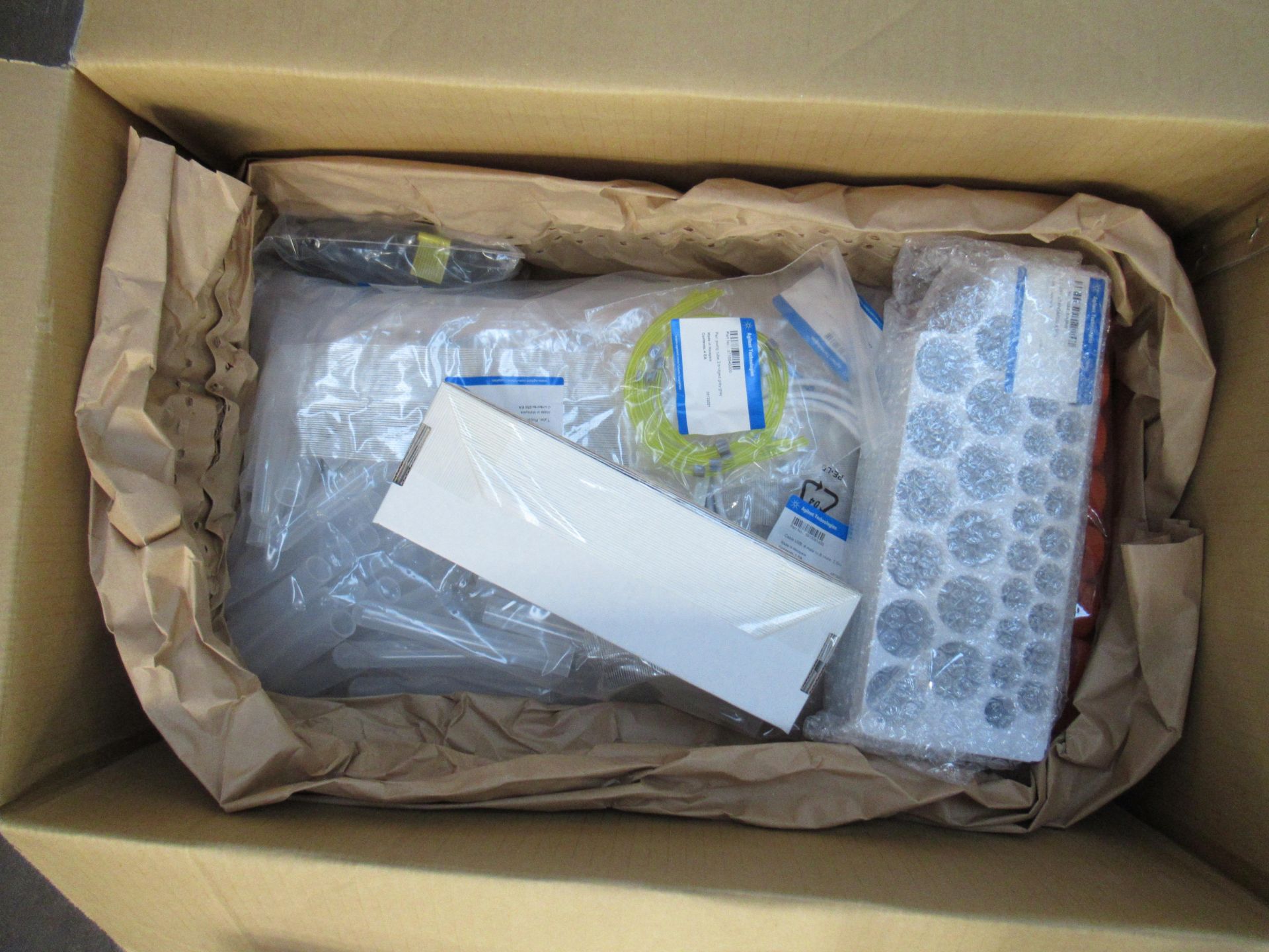 Contents of box to include 34 way stand and rack, centrifuge tubes, sample probe kit, pen pump tube