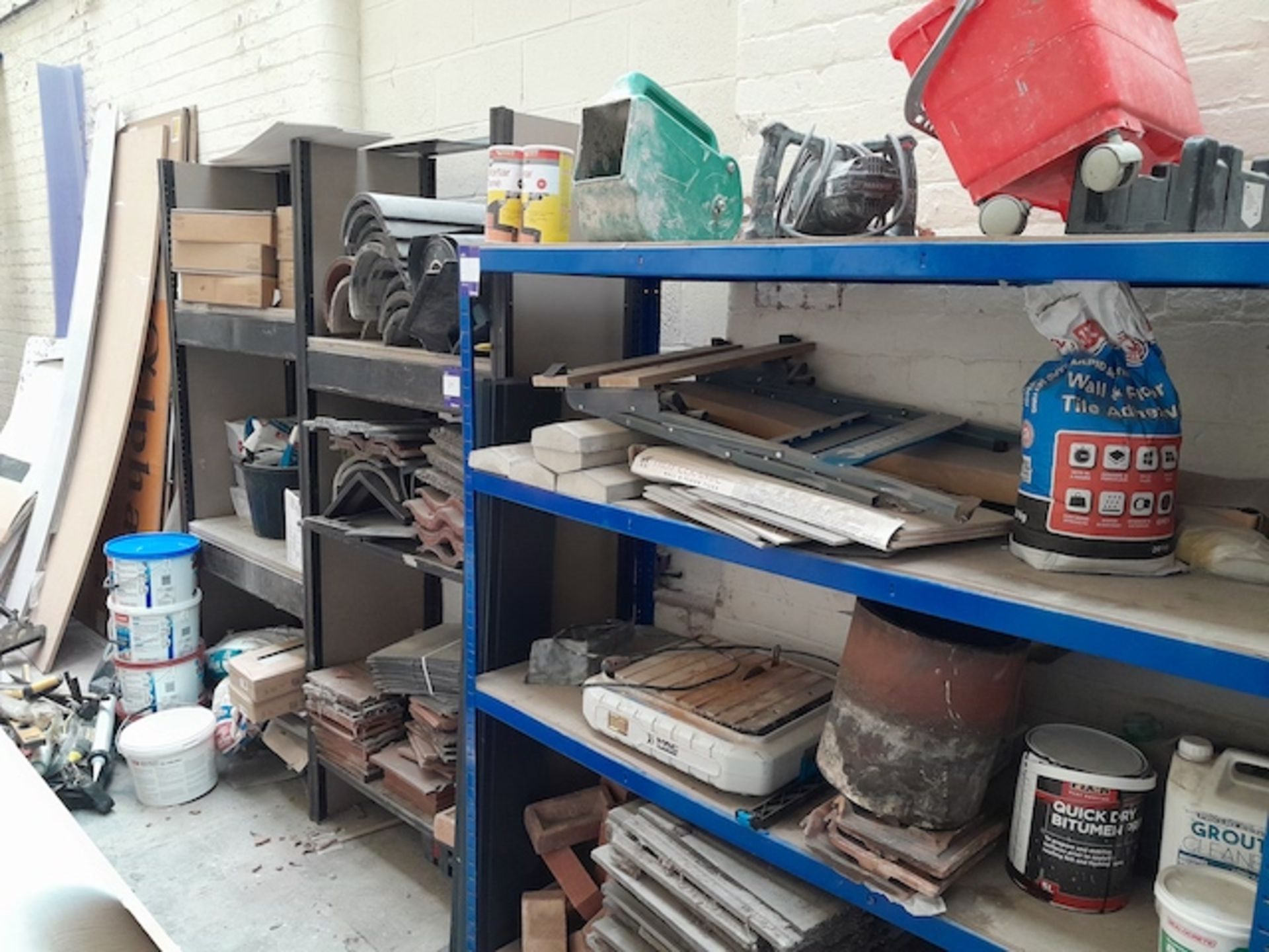 3 racks to include contents of various ridge tiles and other tiles, Macallister tile cutter etc.