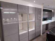 Contemporary grey kitchen with multiple base and wall units, Corian work top with double sink and