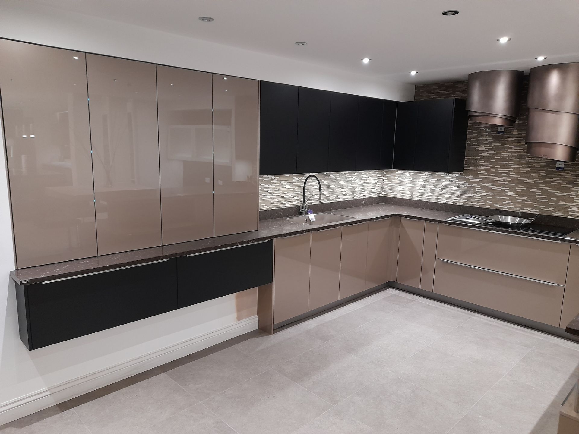 Contemporary high gloss / timber effect kitchen comprising multi base and wall units, breakfast