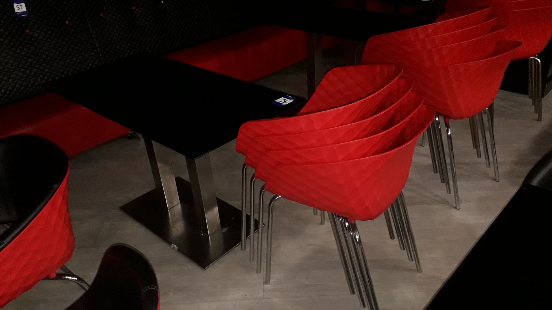 4 x Metamobil red plastic stackable chairs and chrome based pedestal table (1,200mm)