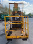 Forklift Man lifting cage