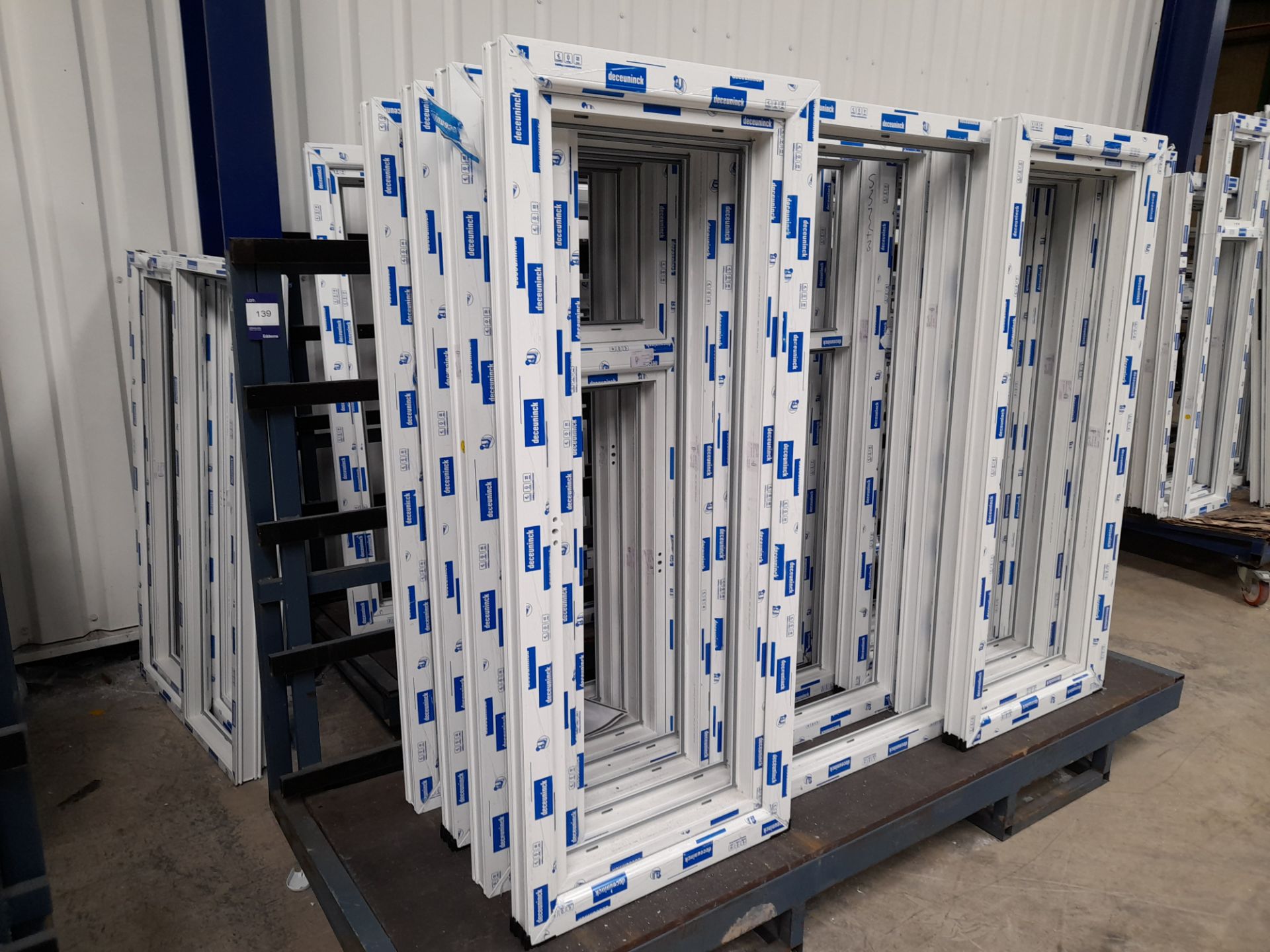 2 x Sheet stock racks with fork truck mounting, and contents to include various unglazed uPVC
