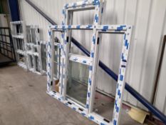 Quantity of glazed/unglazed uPVC frames, to wall