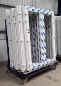 Sheet stock trolley with contents to include uPVC patio door frames (unglazed)