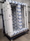 Sheet stock trolley with contents to include uPVC patio door frames (unglazed)