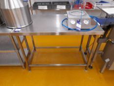 Stainless Steel prep table (1200 x 650), with stainless steel “topped” prep table (1800 x 600)