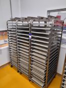 4 x Stainless steel mobile oven racks with 20 x stainless steel mono trays