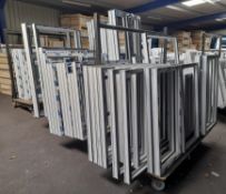 4 x stock trolleys to include assortment of window