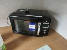 Microwave and various small kitchen appliances