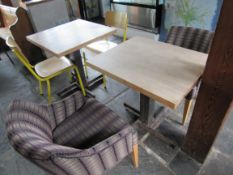 Small square table with 2 upholstered tub chairs