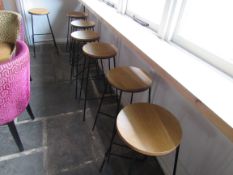 7 Bar stools, round wooden seats on steel frame