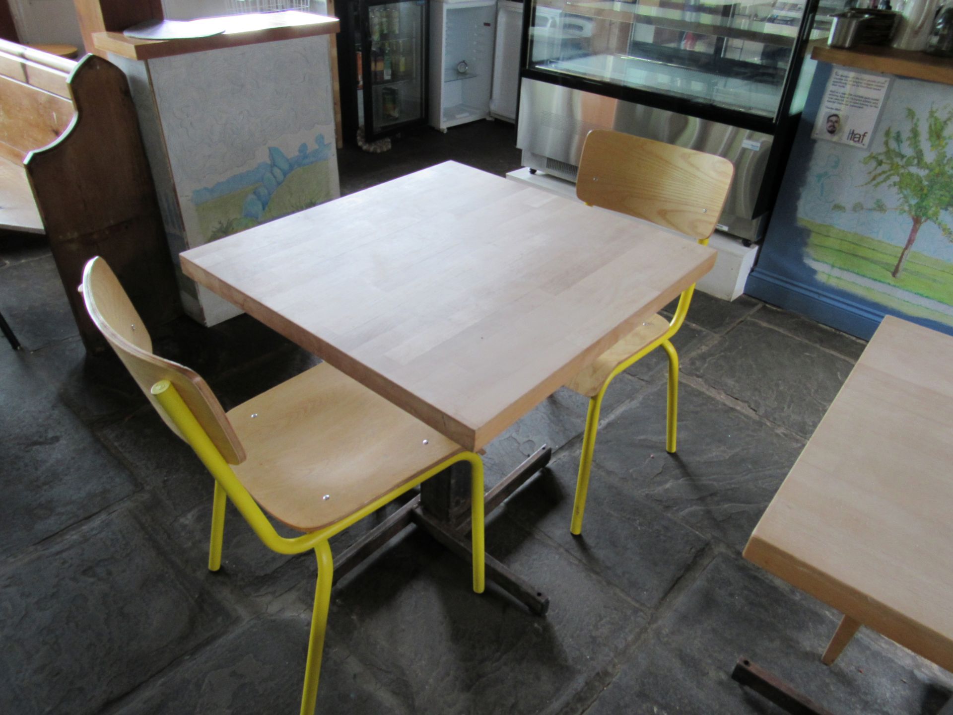 Small square table with 2 café chairs