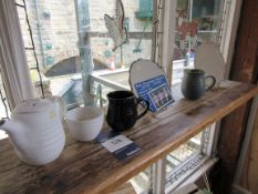 Selection of pottery items to shelf