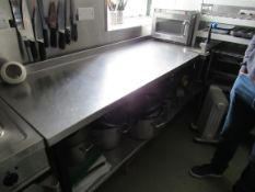 Stainless steel prep table with undershelf, can opener and quantity of assorted cooking pots