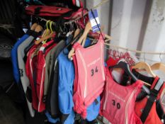 Quantity of various wetsuits, life jackets and helmets