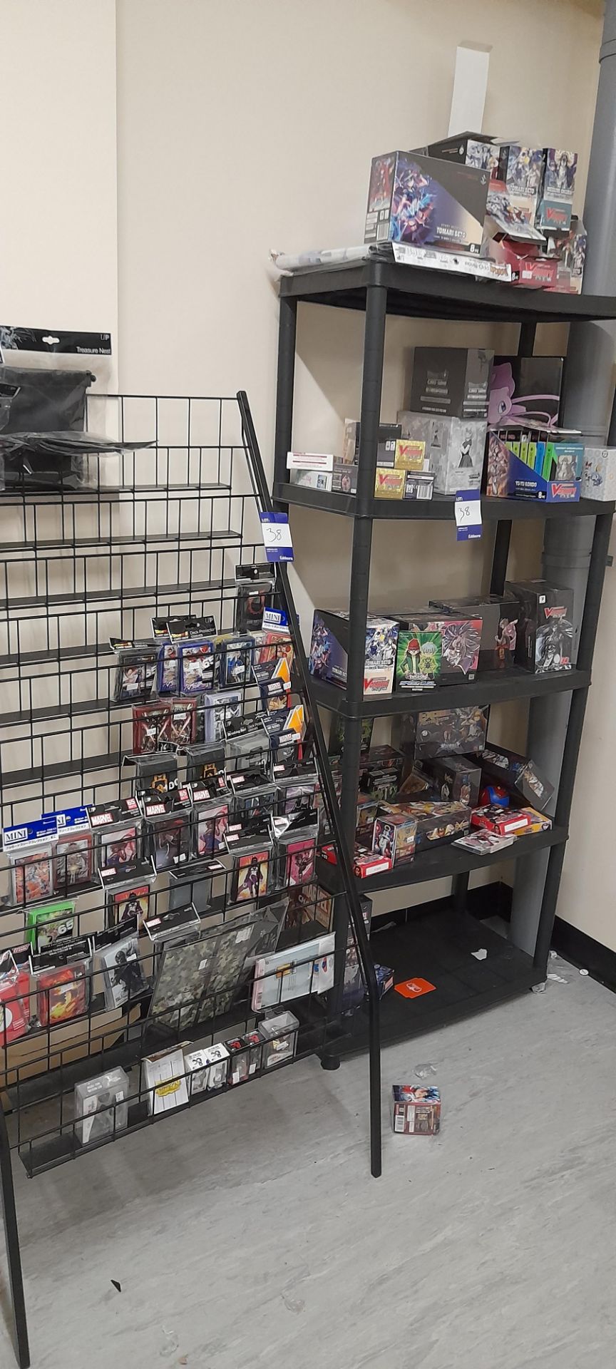 Contents of Five tier plastic shelving unit and metal display stand to include Vanguard CardFight,