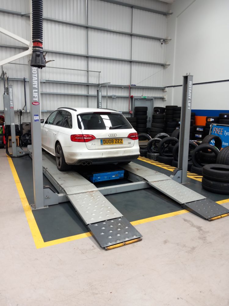 The Remaining Contents of a Tyre Fitter Workshop, to include; Tyre Stock, Rotary Vehicle Ramps & General Garage Plant