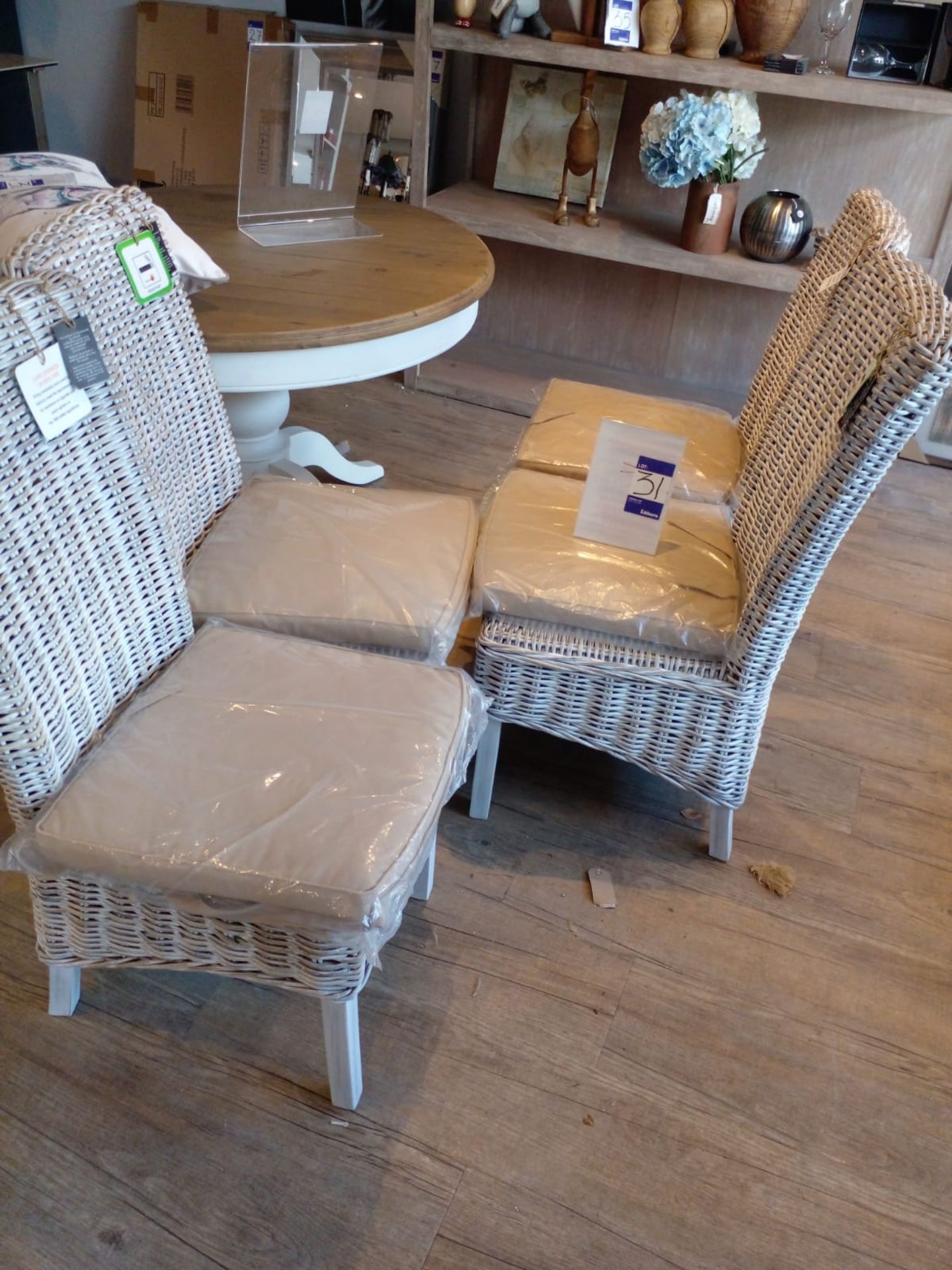 4 Wicker chairs with seat pads