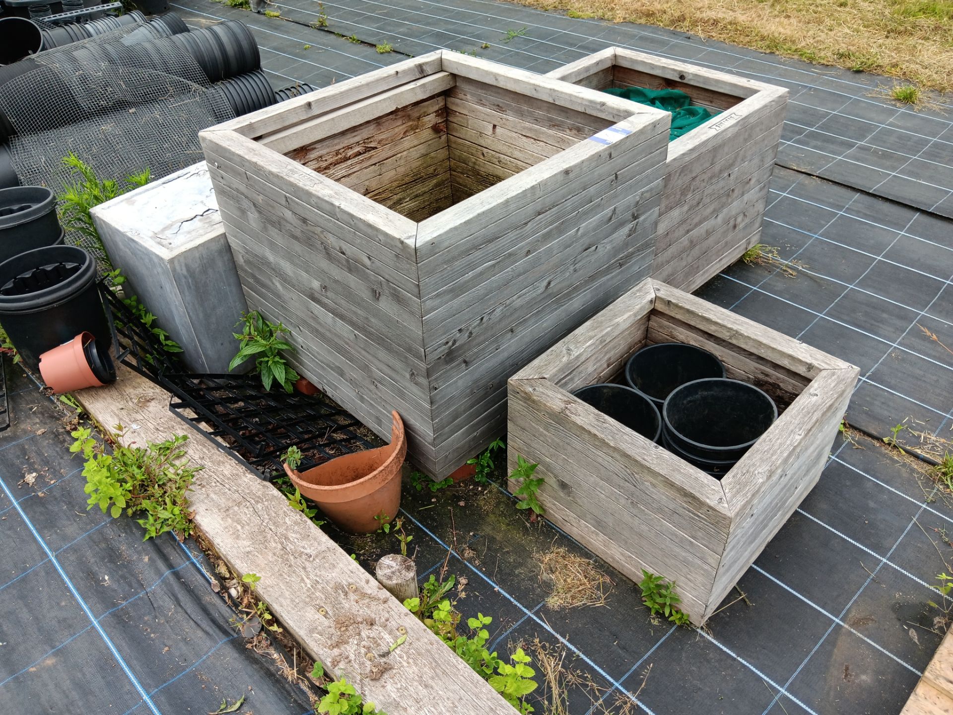 3 various timber planters and composite planter