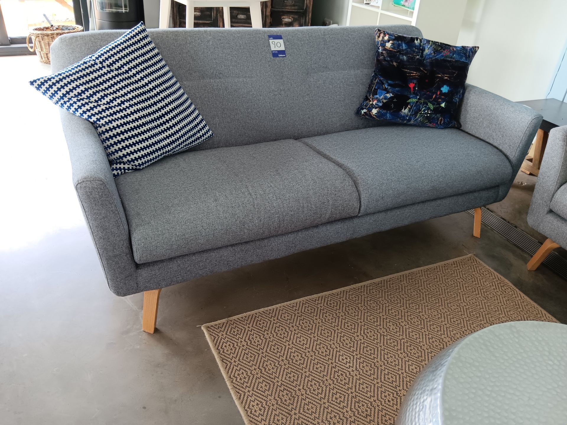 Two seat sofa with grey cloth upholstery