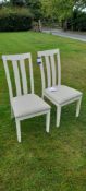 2 x white wooden high back dining chairs with linen covered seats
