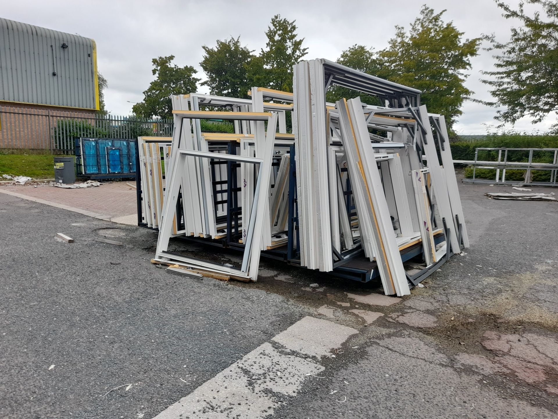 7 x Various A Frame stillages with quantity of cavity enclosures & windows (buyer to remove all)