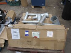 Quantity street light components to pallet