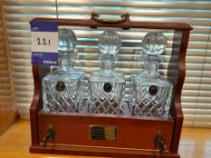 3 glass decanters in travel case