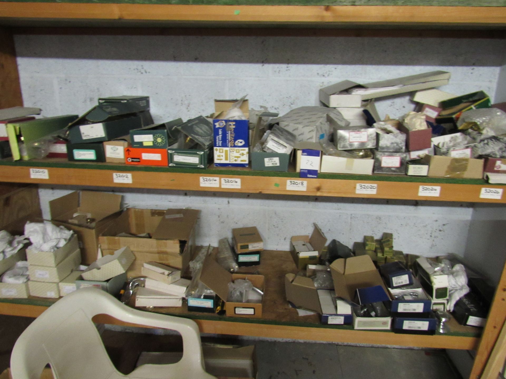 Quantity of assorted ironmongery to two shelves