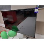 LG 55UN73006LA TV with remote control, and wall bracket (Purchasers responsibility to remove) (