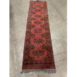 Oriental Runner with a Dark Red Ground