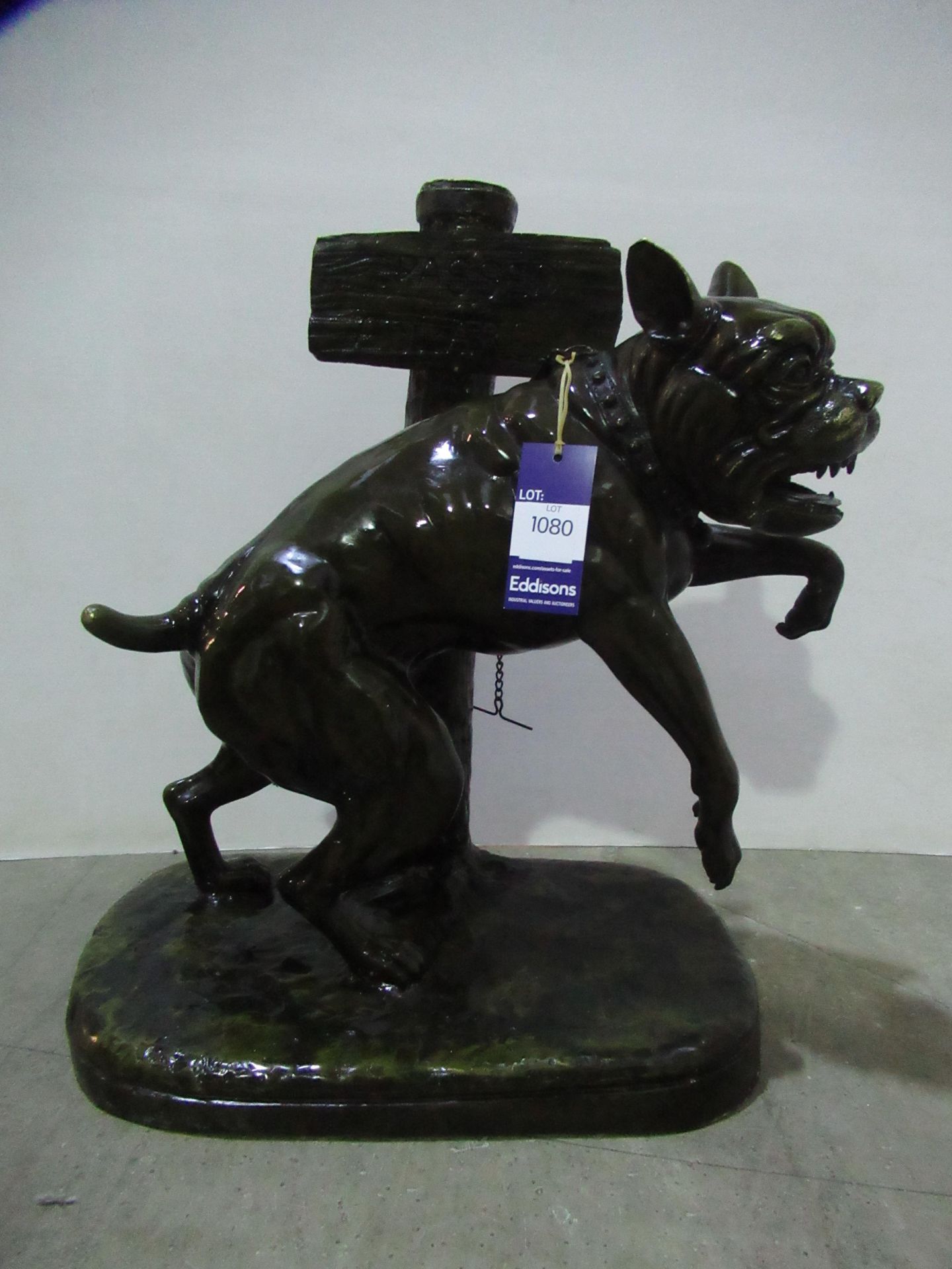 Bronze Bulldog Figure Chained to 'Passed Aul Arg' Signpost