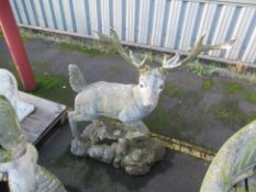 A Fibreglass/Plastic Deer Statue