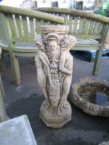 A Bird Bath adorned with 3 Ladies