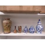 Shelf of Various Porcelain Items including a Vase with painted birds.