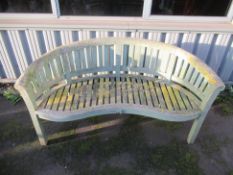 A Curved Wooden Bench